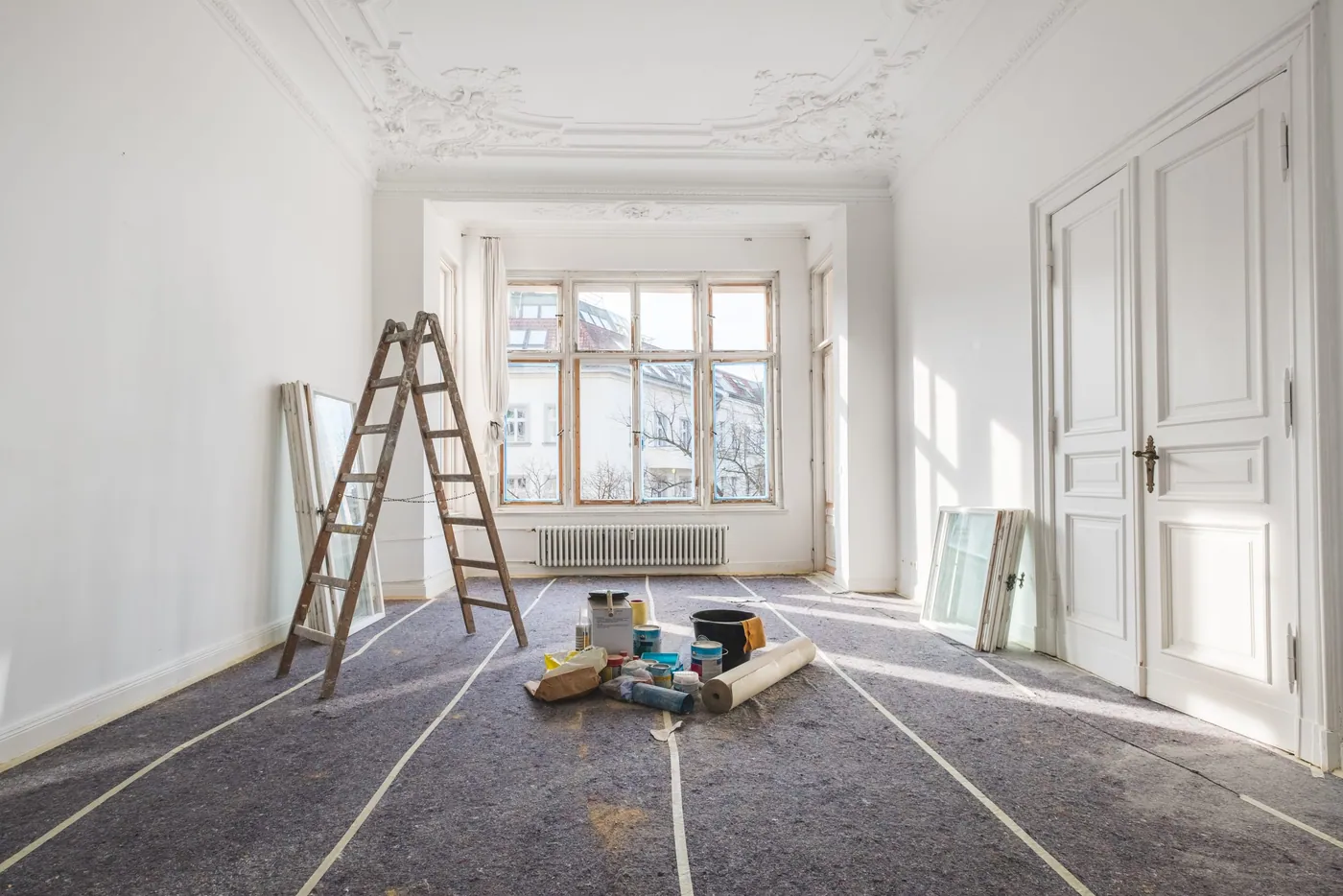 Empty interior room with tall windows